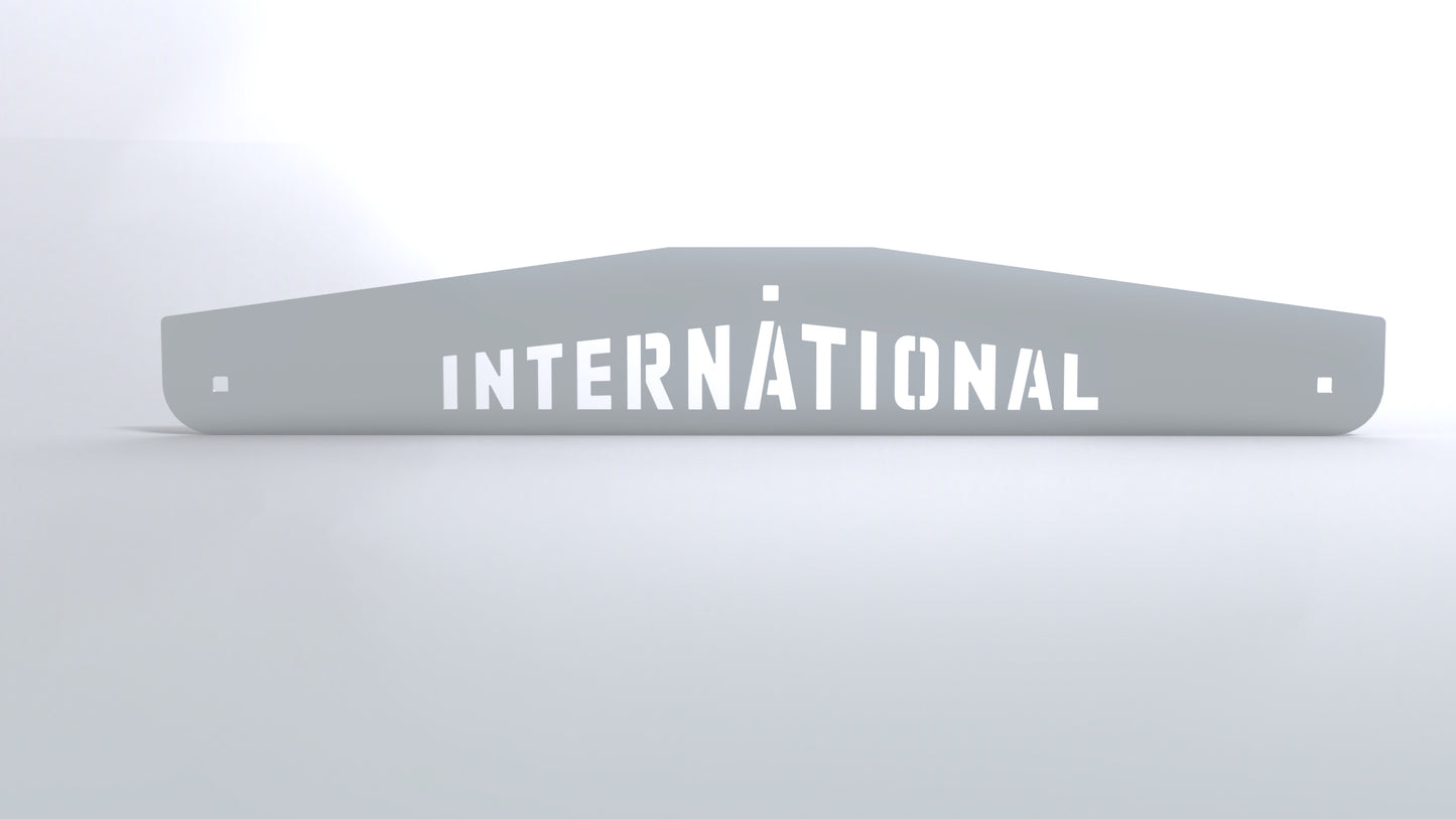 24x3.6 inch stainless steel International logo mud flap weights with tapered ends, includes backplate and hardware, pair displayed.