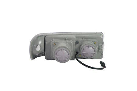 Freightliner FLD 120 Black Projector Headlight Driver Side  -  40542